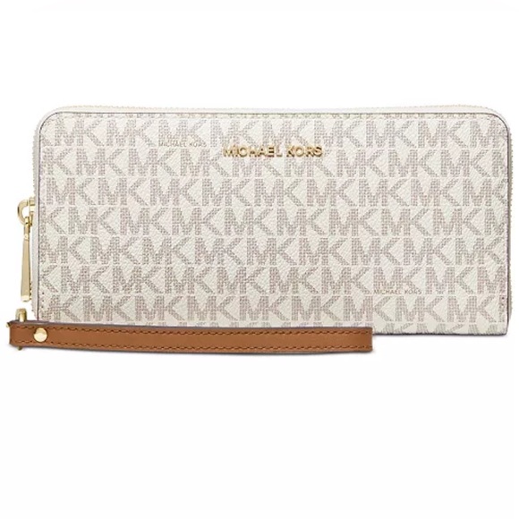 MICHAEL Michael Kors
Logo Jet Set Travel Continental Cream Wristlet Wallet NWT - Picture 13 of 14